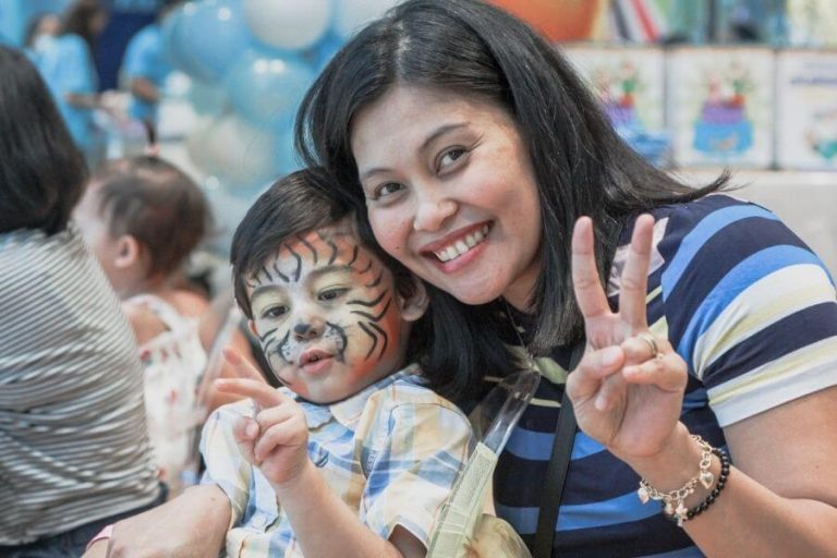 Baby celebrating with Face Art